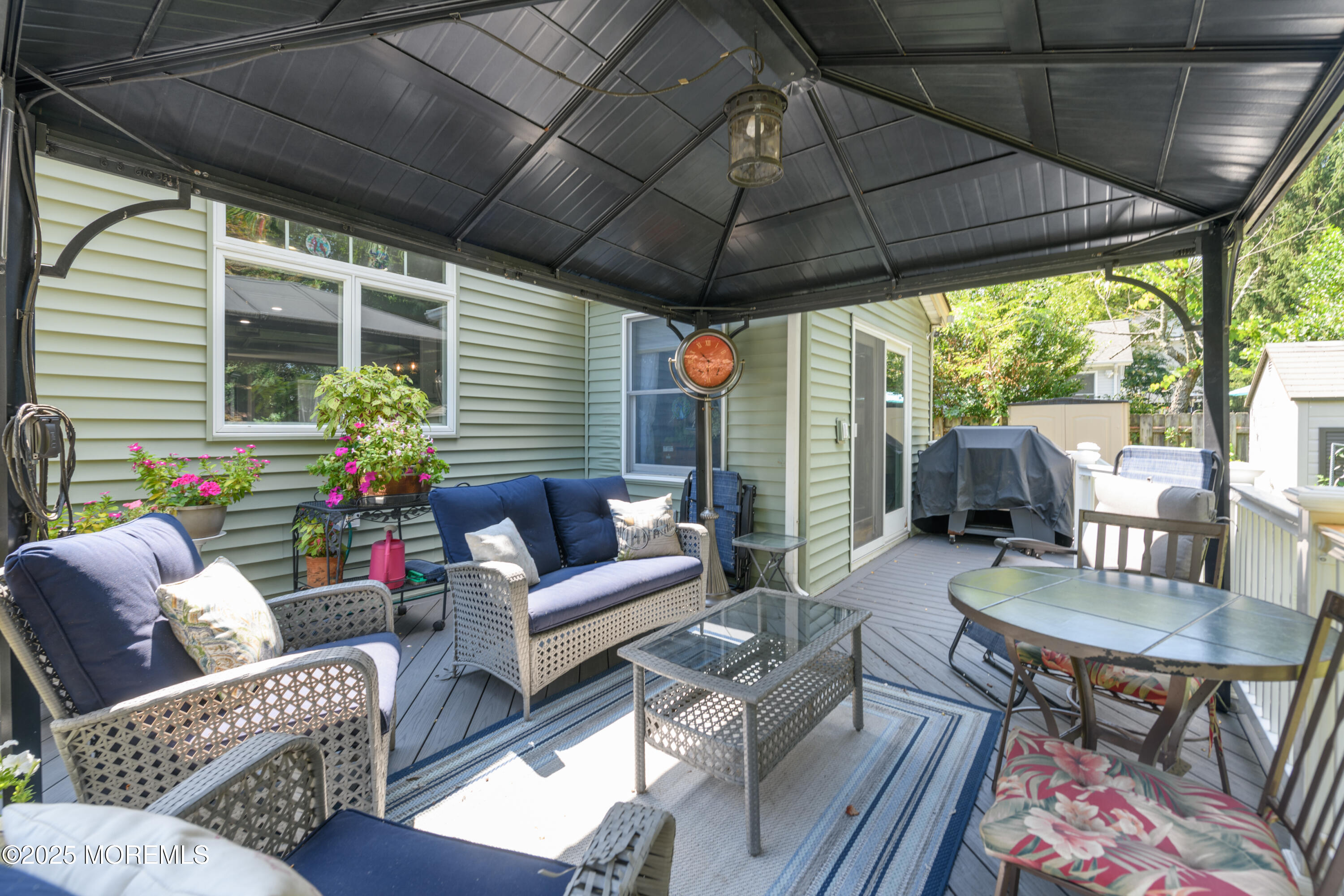 101 Millbrook Place Middletown, NJ 07748 - Photo 36 of 58 a outdoor living space with patio furniture and a potted plant