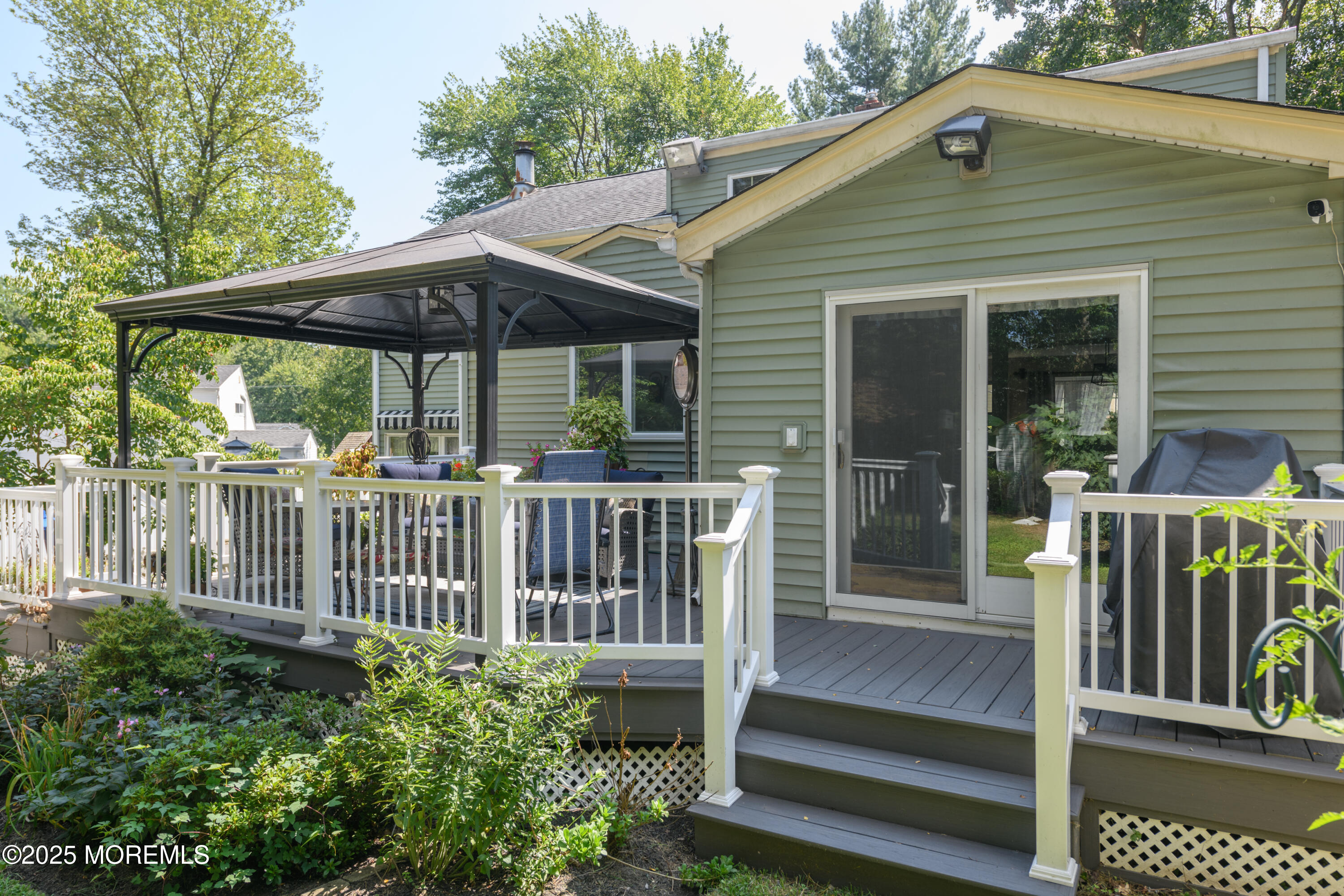 101 Millbrook Place Middletown, NJ 07748 - Photo 38 of 58 a view of a chair and table in the patio