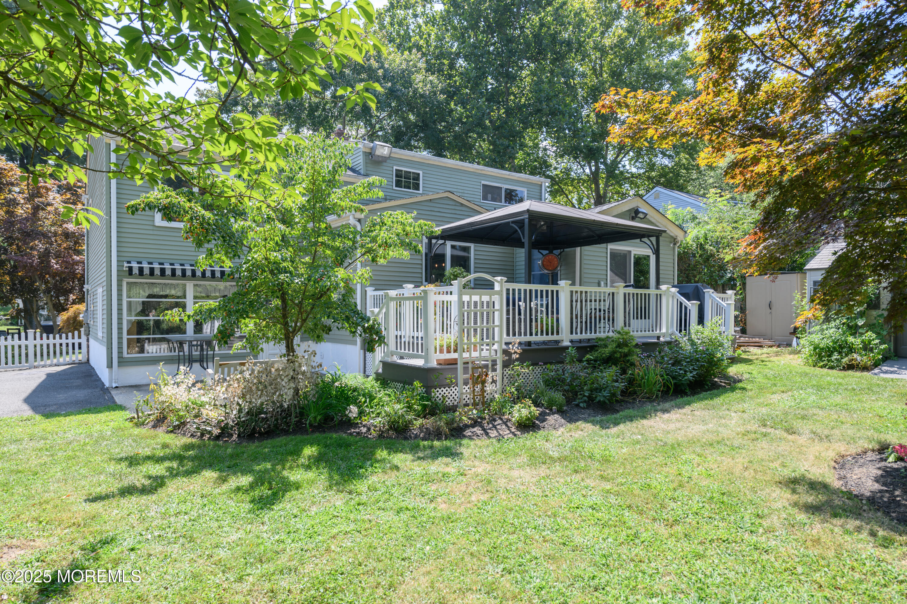 101 Millbrook Place Middletown, NJ 07748 - Photo 42 of 58 a front view of a house with garden