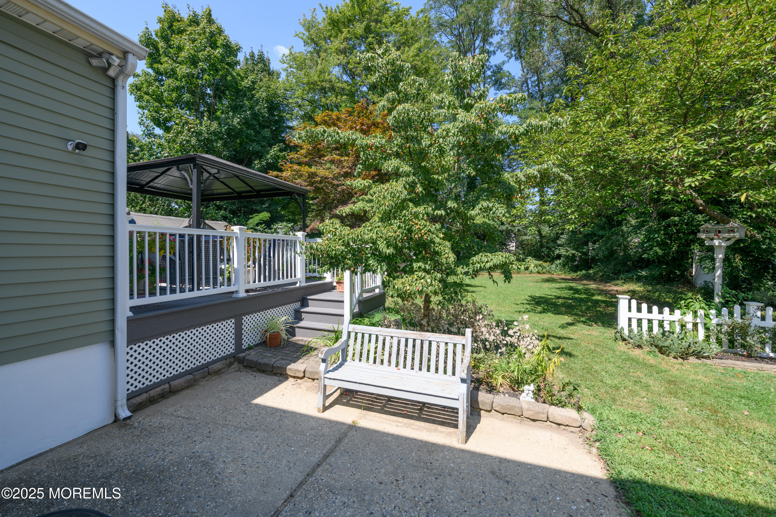 101 Millbrook Place Middletown, NJ 07748 - Photo 54 of 58 a view of porch with a small yard