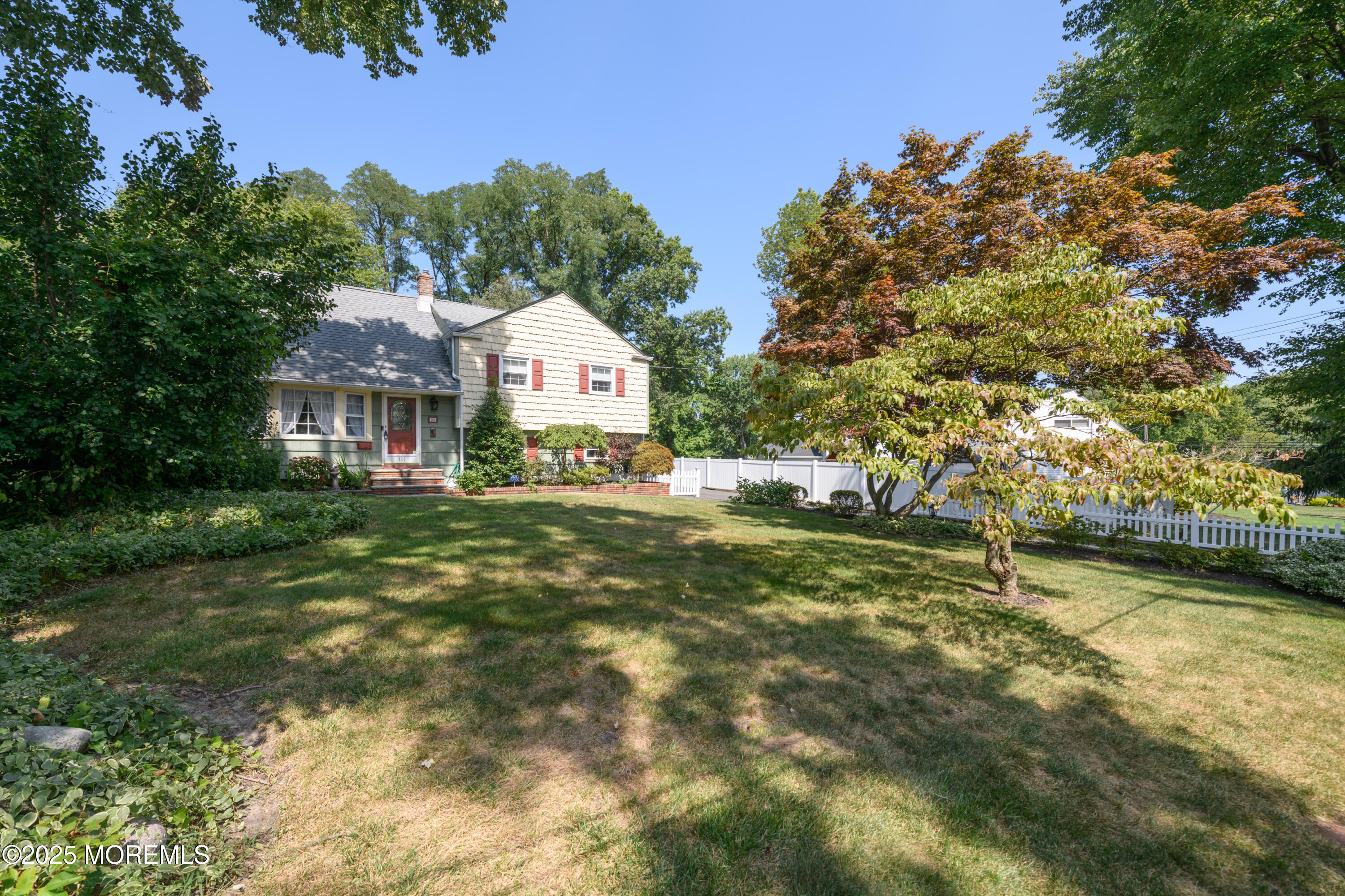 101 Millbrook Place Middletown, NJ 07748 - Photo 8 of 58 a front view of a house with a yard