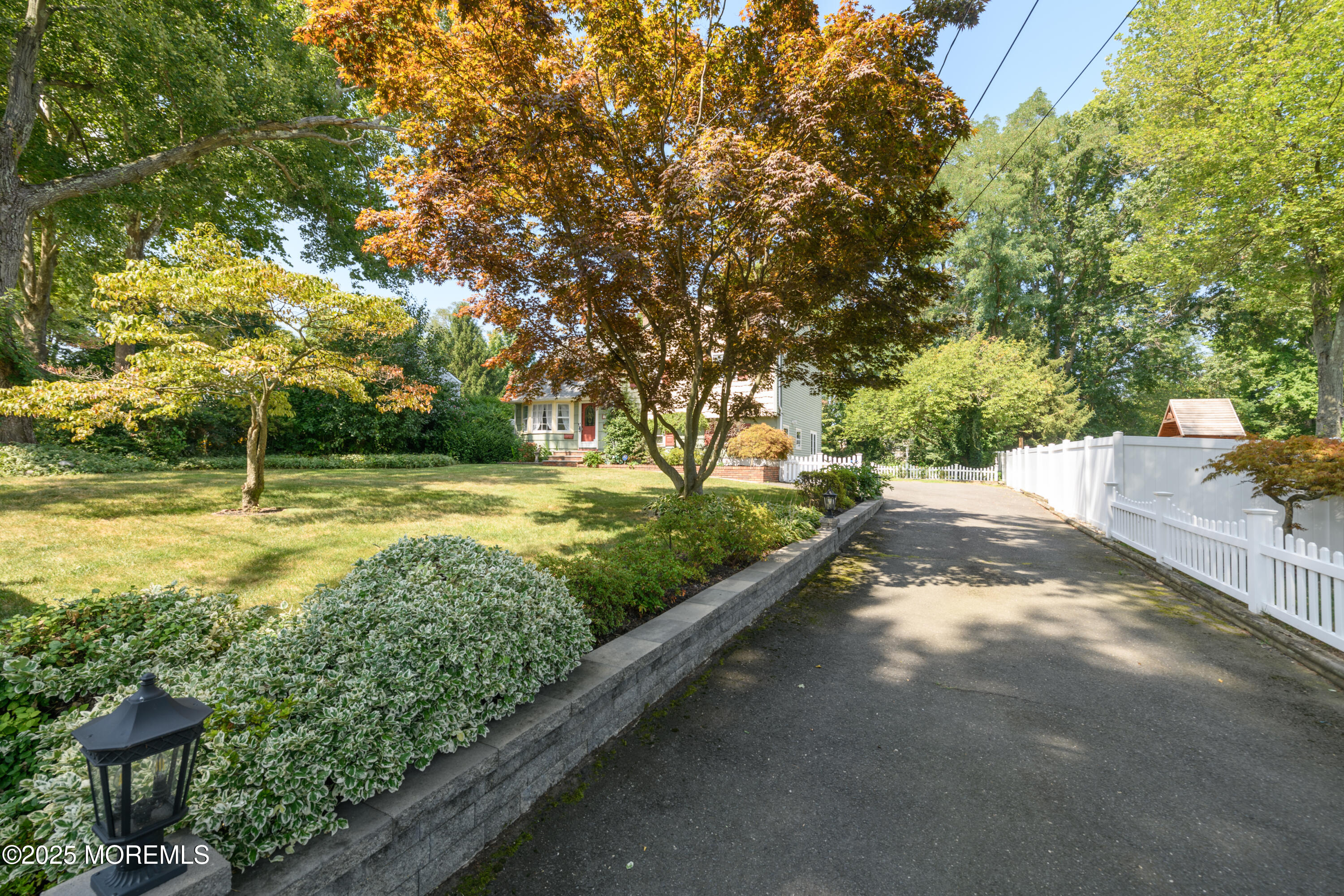 101 Millbrook Place Middletown, NJ 07748 - Photo 10 of 58 a view of a yard with a tree