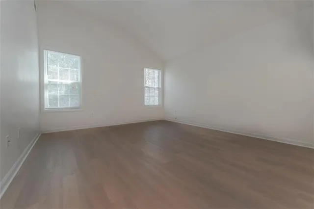 an empty room with windows