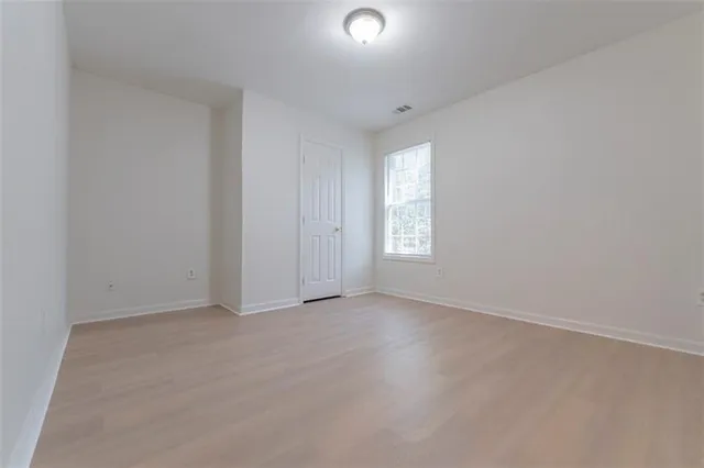 an empty room with a window