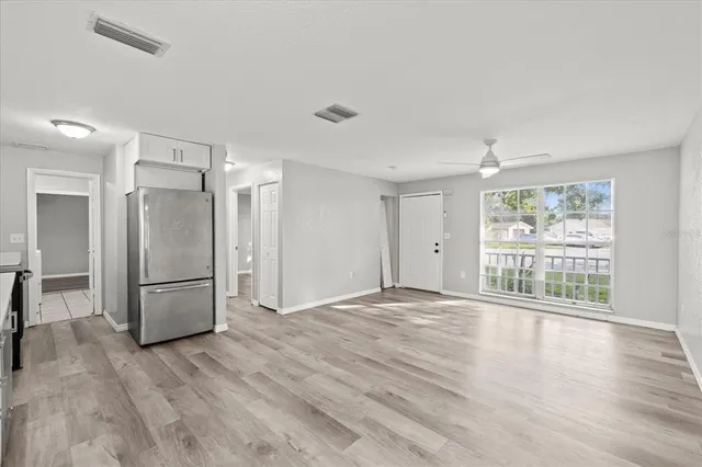 a view of an empty room with a window