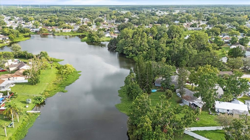 7445 Daggett Terrace New Port Richey, FL 34655 - Photo 2 of 35 an aerial view of city and lake view