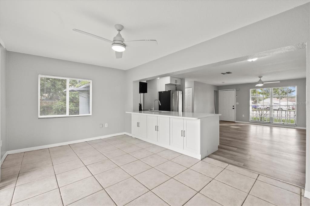 7445 Daggett Terrace New Port Richey, FL 34655 - Photo 7 of 35 a view of an empty room with window and cabinet