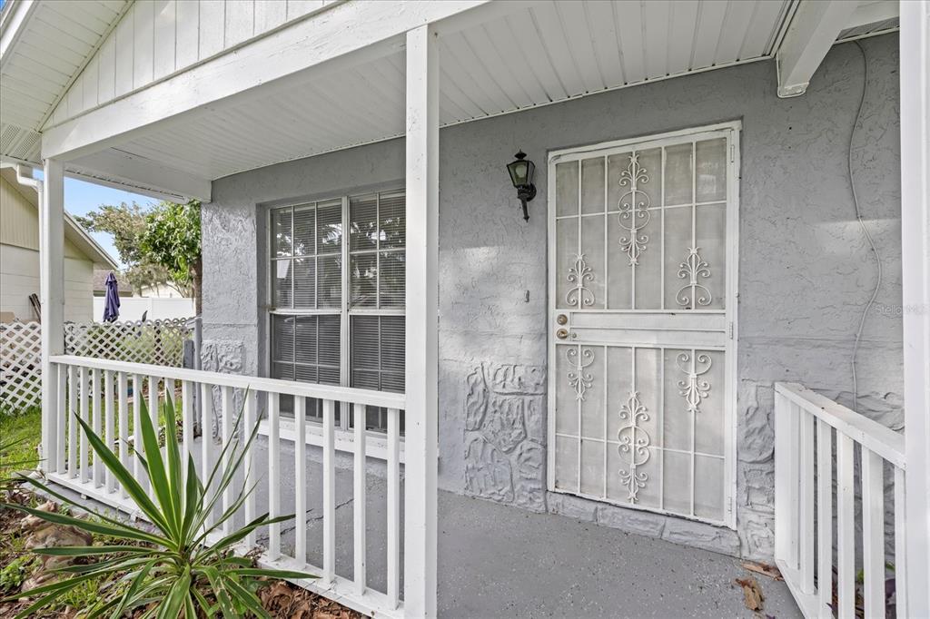 7445 Daggett Terrace New Port Richey, FL 34655 - Photo 10 of 35 a view of balcony with small garden