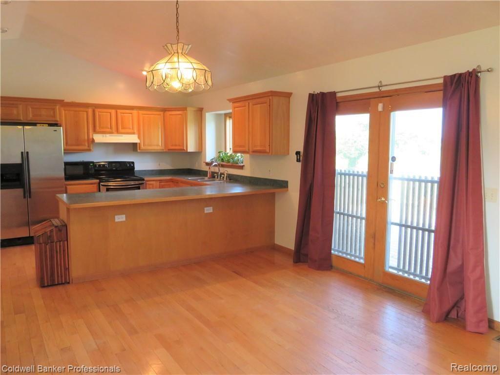 1485 Lansing Road Morrice, MI 48857 - Photo 7 of 30 8 1485 dining area.JPG