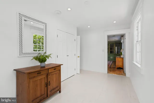 a bathroom with a sink and a window