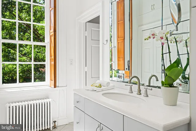 aerial view of a house with a yard