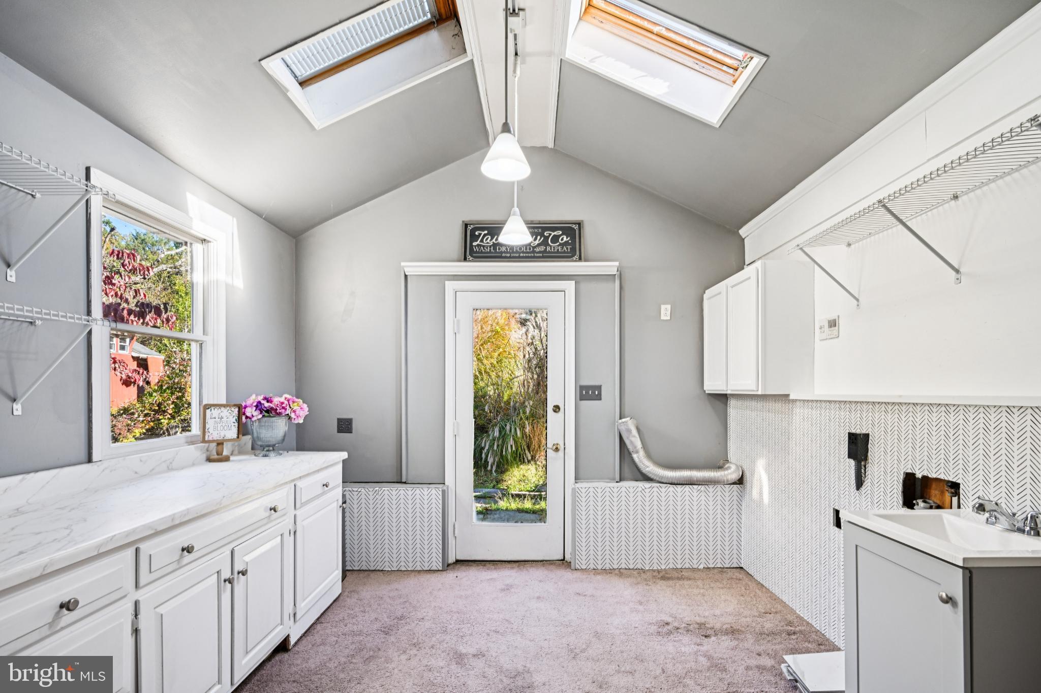 1323 Kepler Road Pottstown, PA 19464 - Photo 25 of 56 Bright and airy laundry room with skylights.