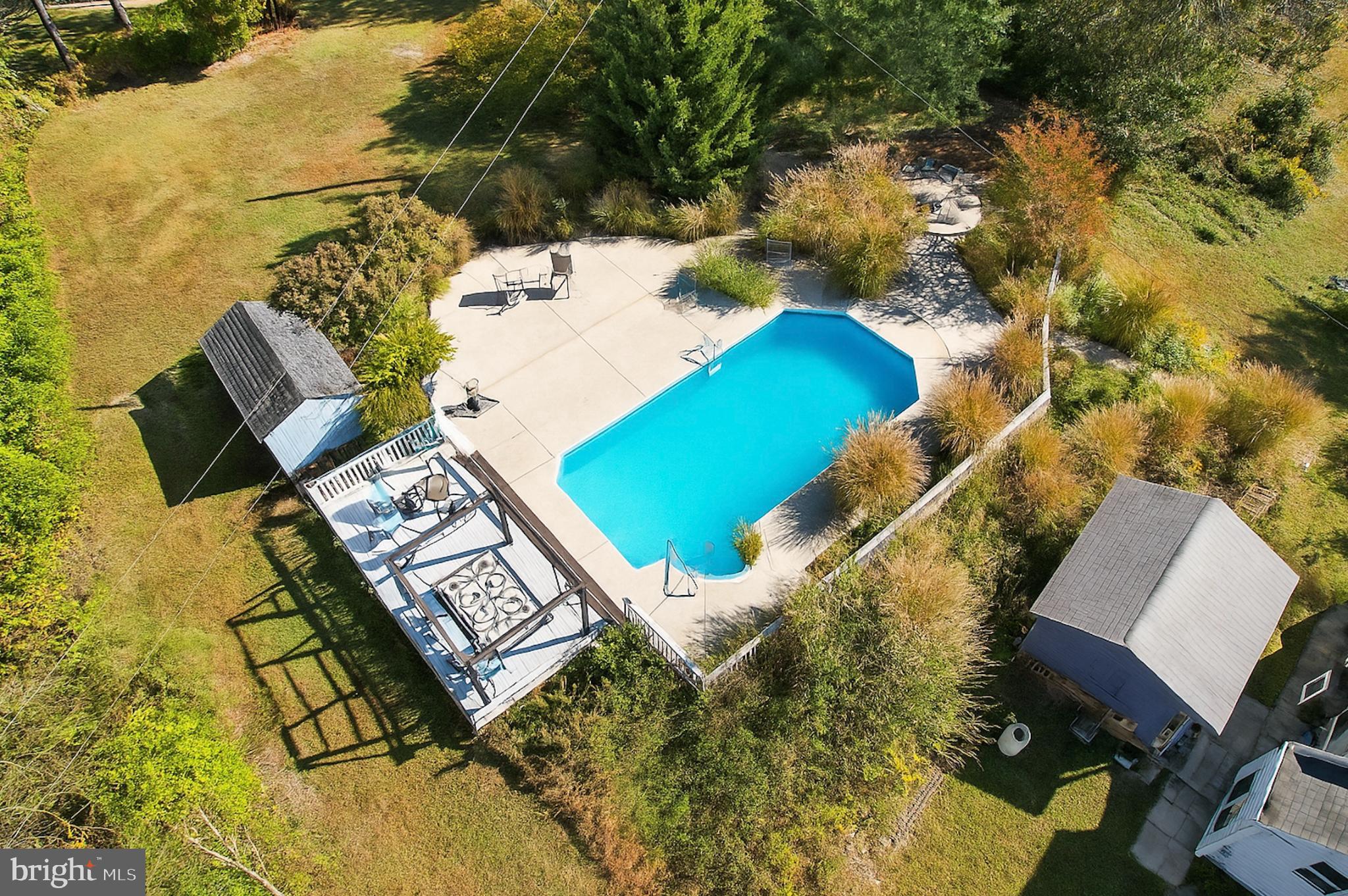 1323 Kepler Road Pottstown, PA 19464 - Photo 44 of 56 Serene backyard oasis with inviting pool.
