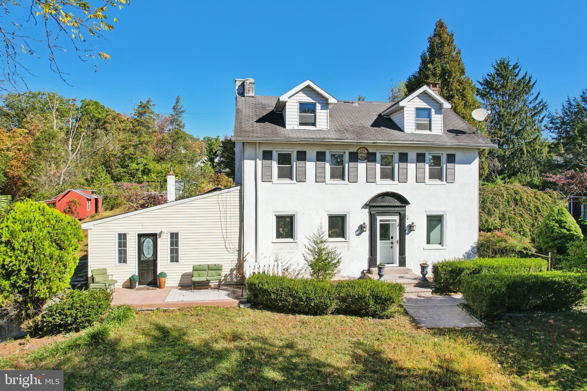1323 Kepler Road Pottstown, PA 19464 - Photo 5 of 56 Charming two-story home with lush greenery.