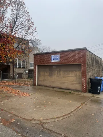 a front view of a house with a garage