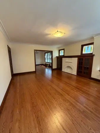 a view of a livingroom with wooden floor