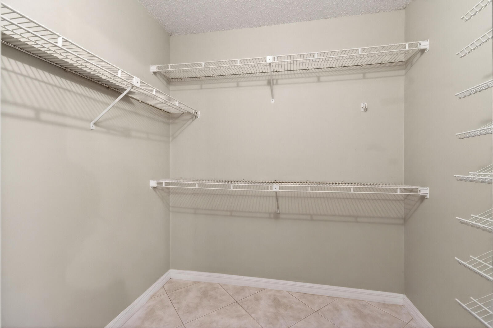3951 Northeast 19th Road, Unit 1701 Pompano Beach, FL 33064 - Photo 56 of 82 a view of a room with racks on the wall