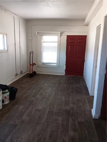 a kitchen with a stove and a refrigerator