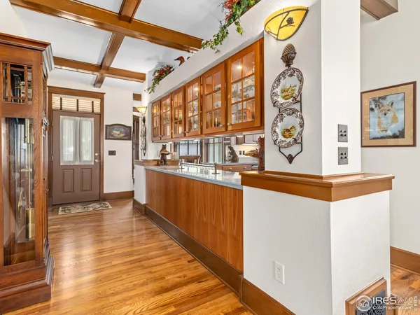 a kitchen with stainless steel appliances a refrigerator and a stove