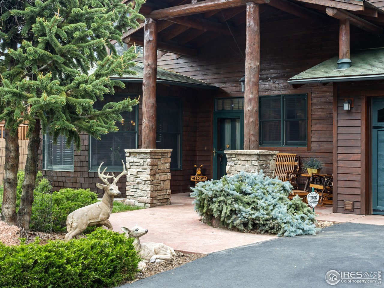 685 Riverside Drive Estes Park, CO 80517 - Photo 8 of 45 A welcoming entry of stone & lot timbers