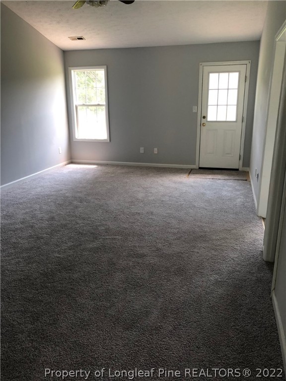 450 Main Street Lillington, NC 27546 - Photo 4 of 11 a view of an empty room with a window