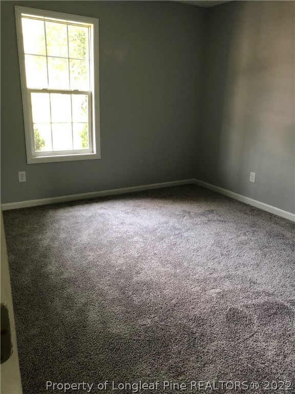 450 Main Street Lillington, NC 27546 - Photo 10 of 11 an empty room with a window