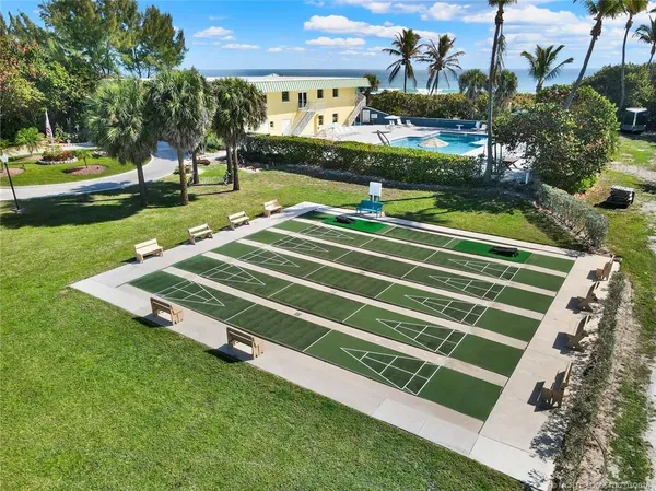 a view of a pathway with a yard
