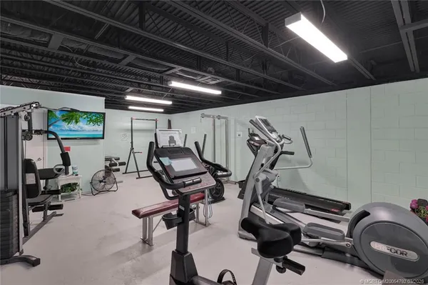 a view of a room with gym equipment