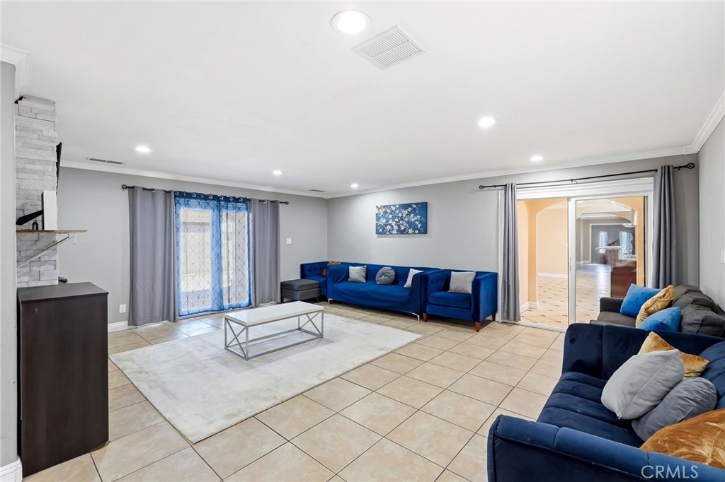 8630 Sharp Avenue Sun Valley, CA 91352 - Photo 15 of 62 a living room with furniture and a couch