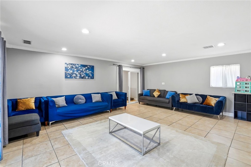 8630 Sharp Avenue Sun Valley, CA 91352 - Photo 16 of 62 a living room with furniture and a couch