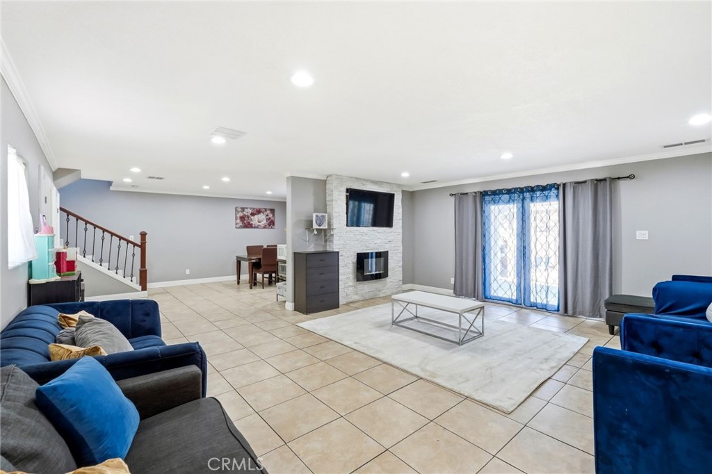 8630 Sharp Avenue Sun Valley, CA 91352 - Photo 18 of 62 a living room with furniture and a flat screen tv