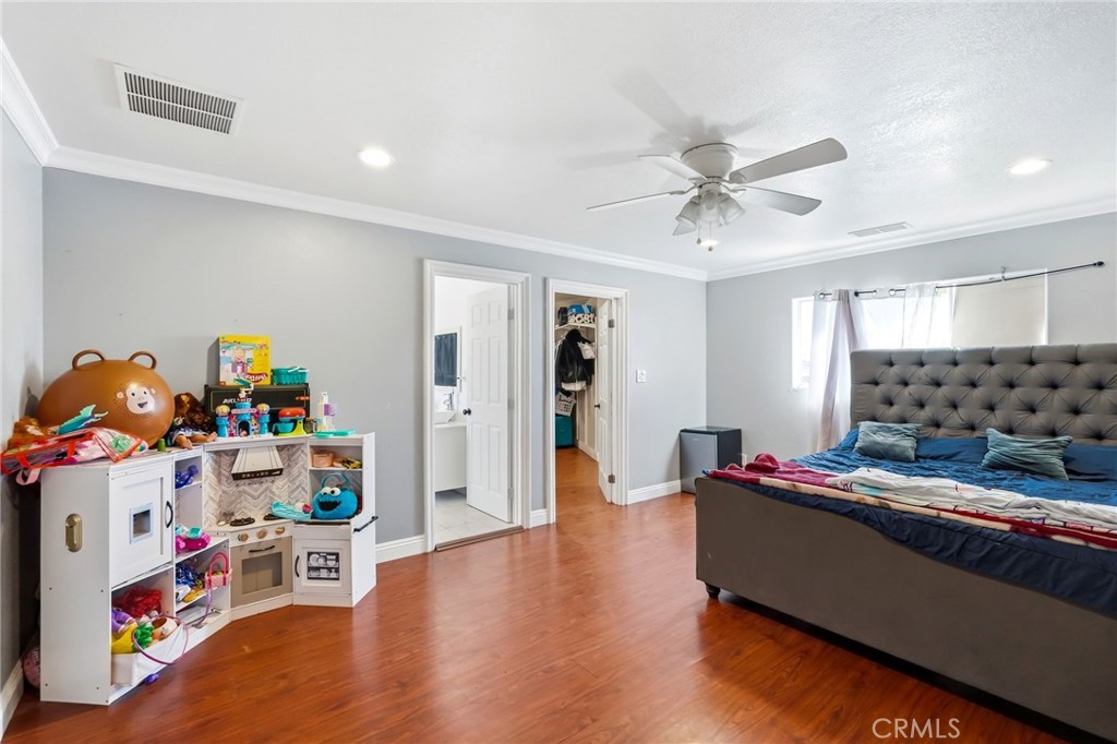 8630 Sharp Avenue Sun Valley, CA 91352 - Photo 24 of 62 a living room with furniture and a wooden floor