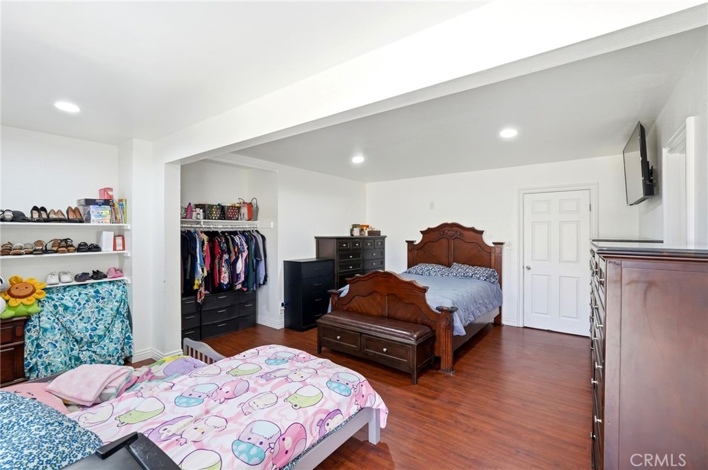 8630 Sharp Avenue Sun Valley, CA 91352 - Photo 32 of 62 a living room with furniture and a wooden floor