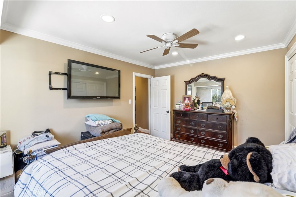 8630 Sharp Avenue Sun Valley, CA 91352 - Photo 40 of 62 a bedroom with a bed and a mirror
