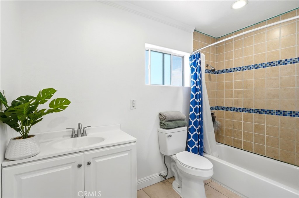 8630 Sharp Avenue Sun Valley, CA 91352 - Photo 44 of 62 a bathroom with a sink toilet and shower