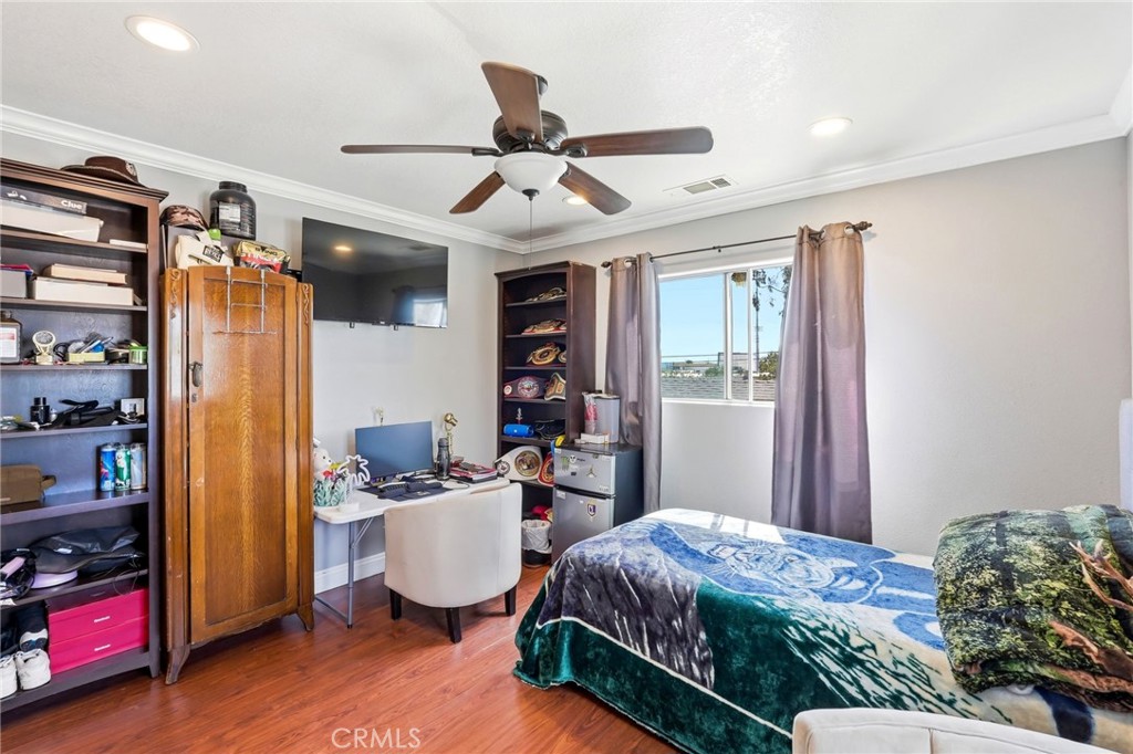 8630 Sharp Avenue Sun Valley, CA 91352 - Photo 47 of 62 a bedroom with furniture and a window