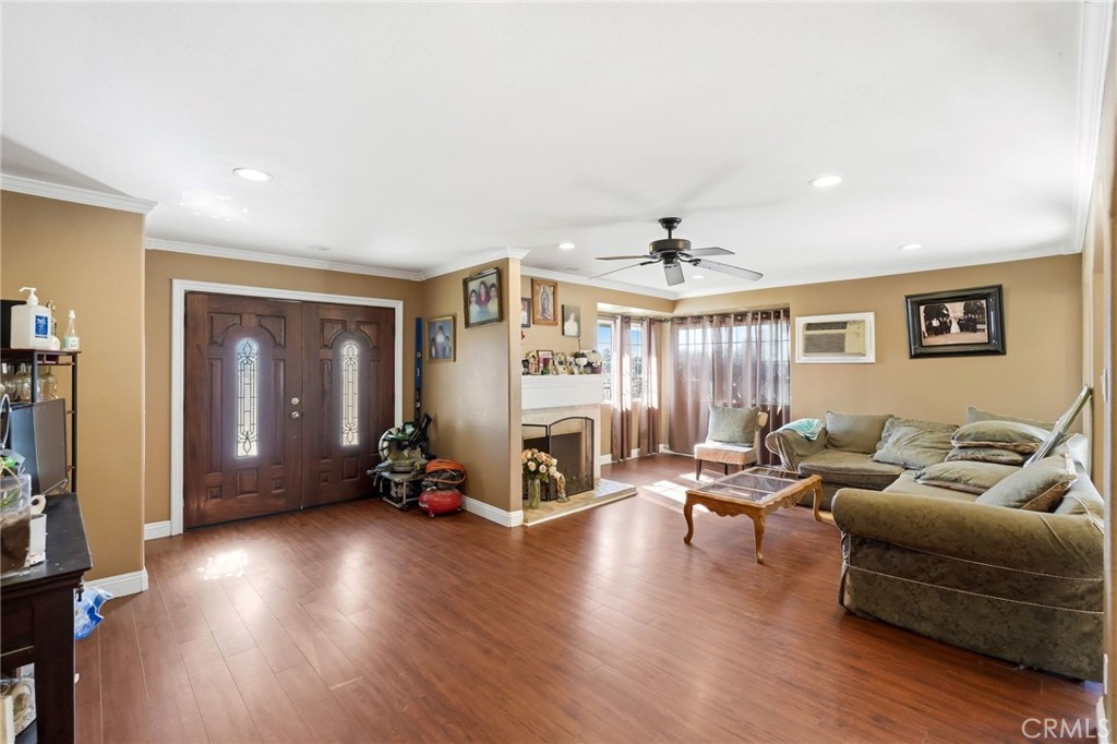 8630 Sharp Avenue Sun Valley, CA 91352 - Photo 5 of 62 a living room with furniture and wooden floor