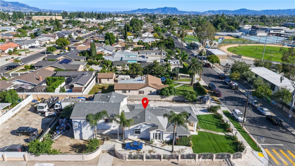 8630 Sharp Avenue Sun Valley, CA 91352 - Photo 52 of 62 an aerial view of house with yard swimming pool and mountain view