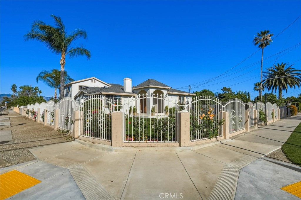 8630 Sharp Avenue Sun Valley, CA 91352 - Photo 55 of 62 a view of a house with a yard and potted plants