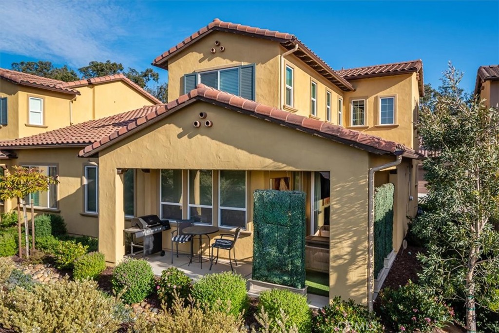 1170 Spring Azure Way, Unit 45 Nipomo, CA 93444 - Photo 16 of 43 front view of house with a yard