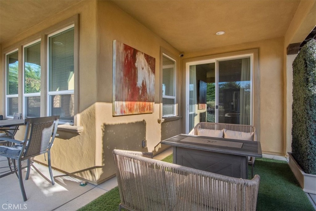 1170 Spring Azure Way, Unit 45 Nipomo, CA 93444 - Photo 20 of 43 a living room with furniture and a window