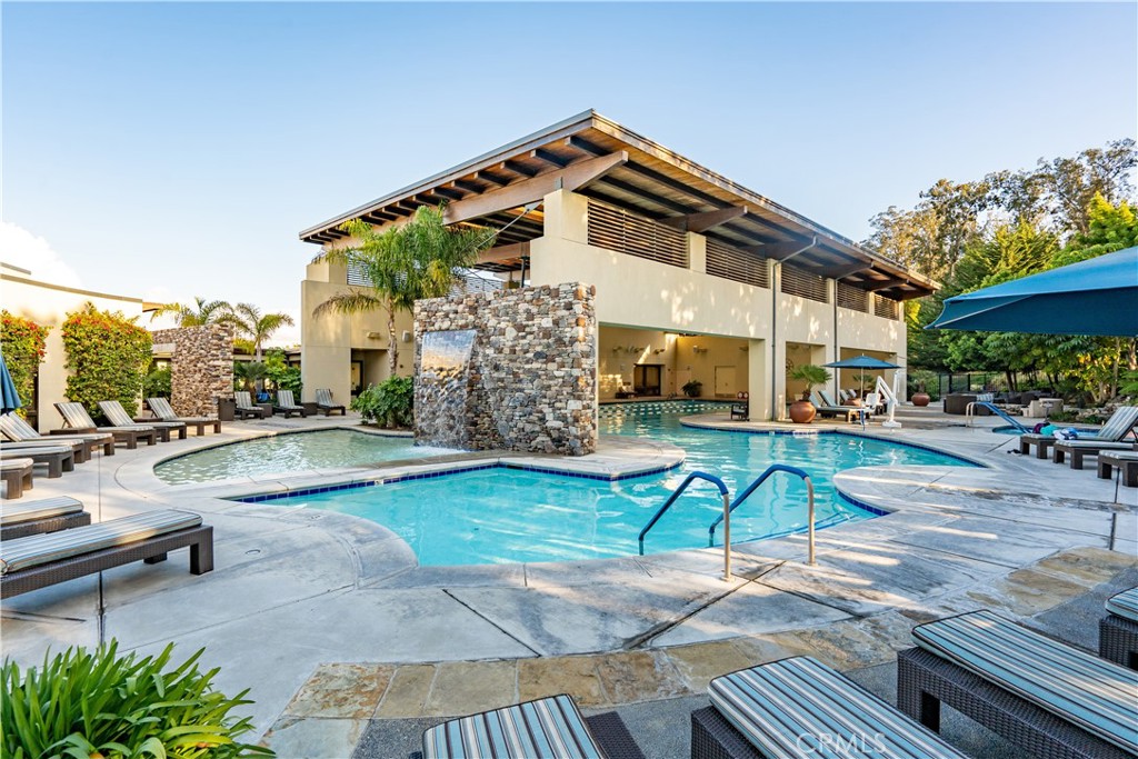 1170 Spring Azure Way, Unit 45 Nipomo, CA 93444 - Photo 31 of 43 a view of a house with backyard and sitting area