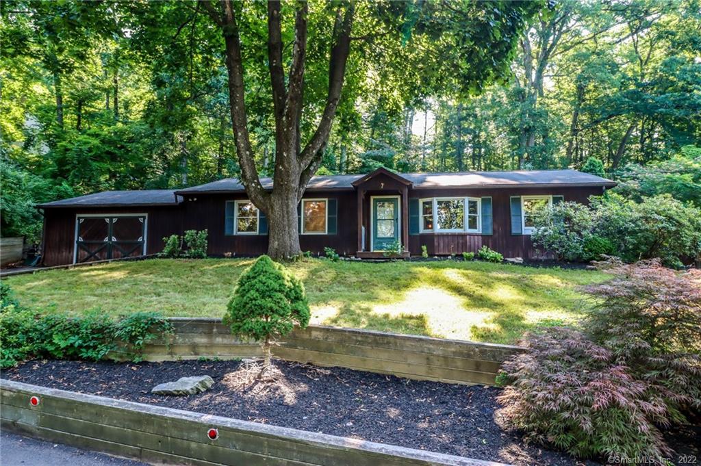 7 Tommys Lane Brookfield, CT 06804 - Photo 1 of 1 a front view of a house with garden