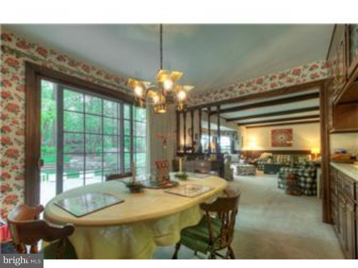 230 Wegman Road Reading, PA 19606 - Photo 12 of 25 a dining room with furniture a chandelier and window