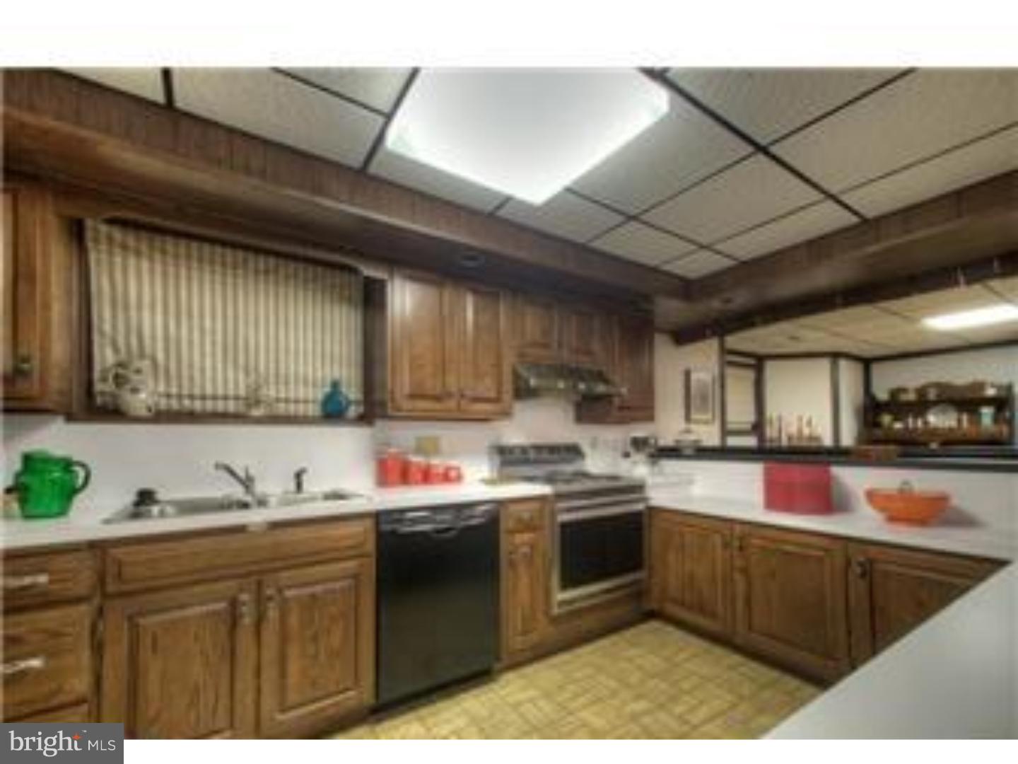 230 Wegman Road Reading, PA 19606 - Photo 18 of 25 a kitchen with stainless steel appliances granite countertop sink stove and cabinets