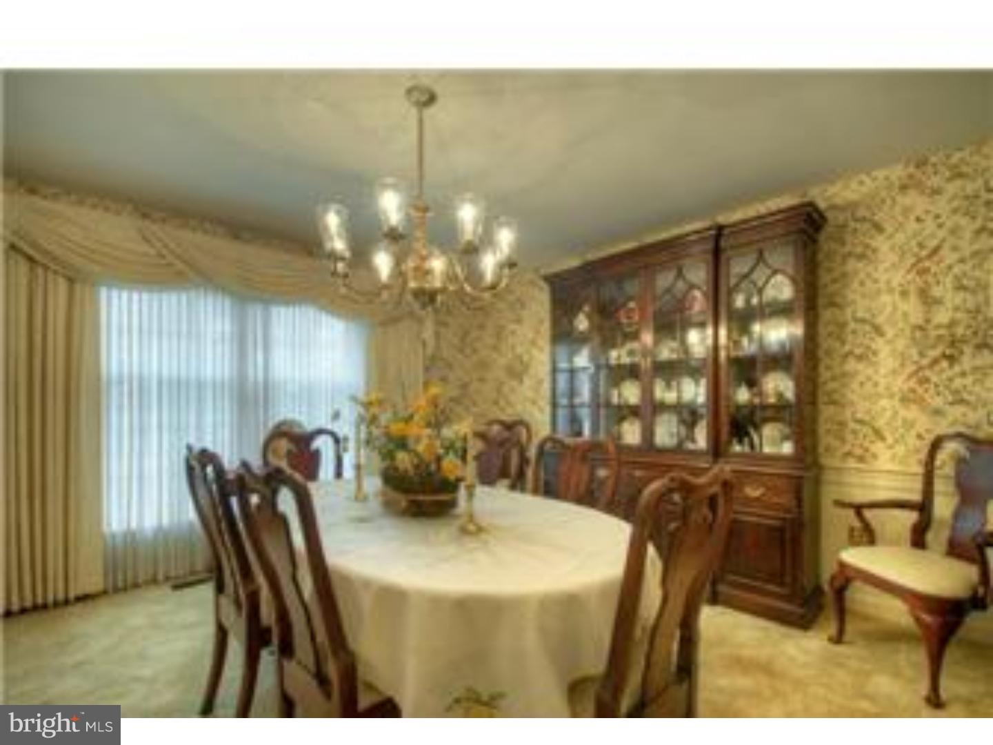 230 Wegman Road Reading, PA 19606 - Photo 9 of 25 a view of a dining room with furniture and chandelier