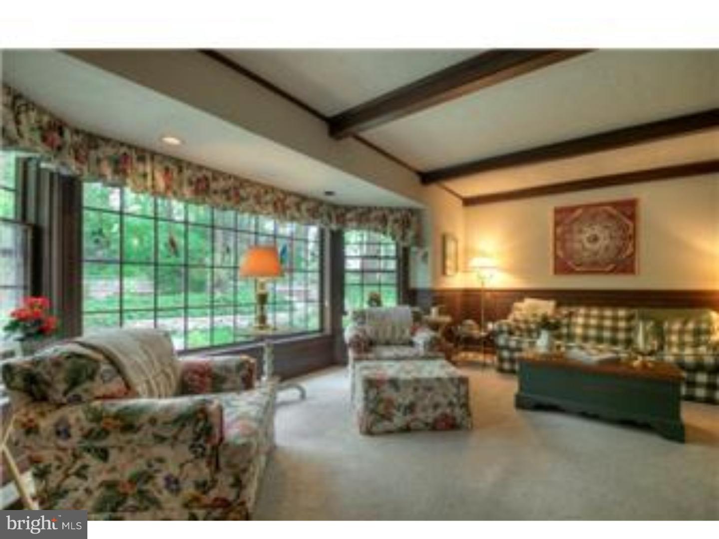 230 Wegman Road Reading, PA 19606 - Photo 10 of 25 a living room with furniture and a floor to ceiling window