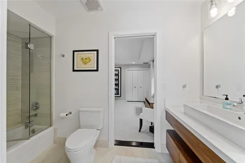 a view of a storage and utility room with a washer dryer