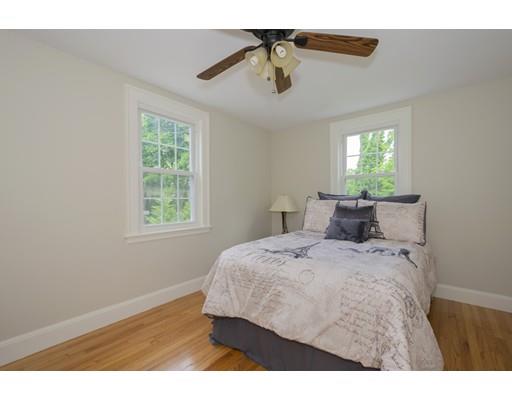 39 Wood Street Lexington, MA 02421 - Photo 20 of 42 a bedroom with a bed and window