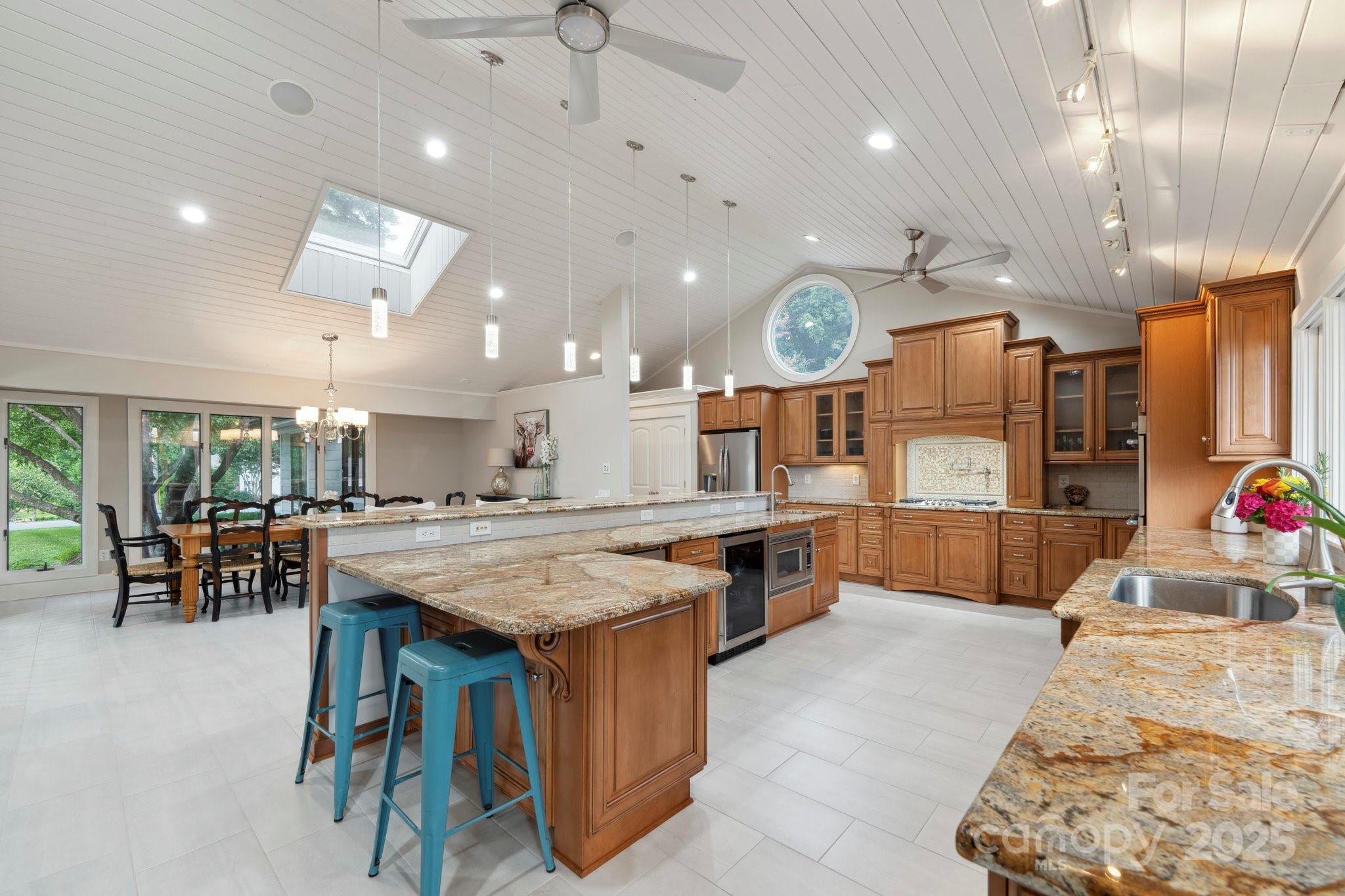 22501 John Gamble Road Cornelius, NC 28031 - Photo 13 of 47 a kitchen with lots of counter top space